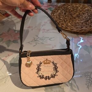 Juicy Couture Quilted Light Pink Mini Wristlet with Black Trim and Gold Hardware